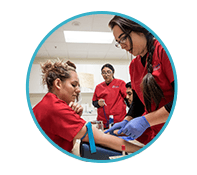 medical assisting student training to draw blood