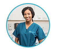 Unitek nursing student standing in a doctor's office