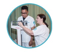 rn-to-bsn instructor uses patient weight scales on Unitek nursing student