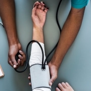 Up close view of nurse checking vitals