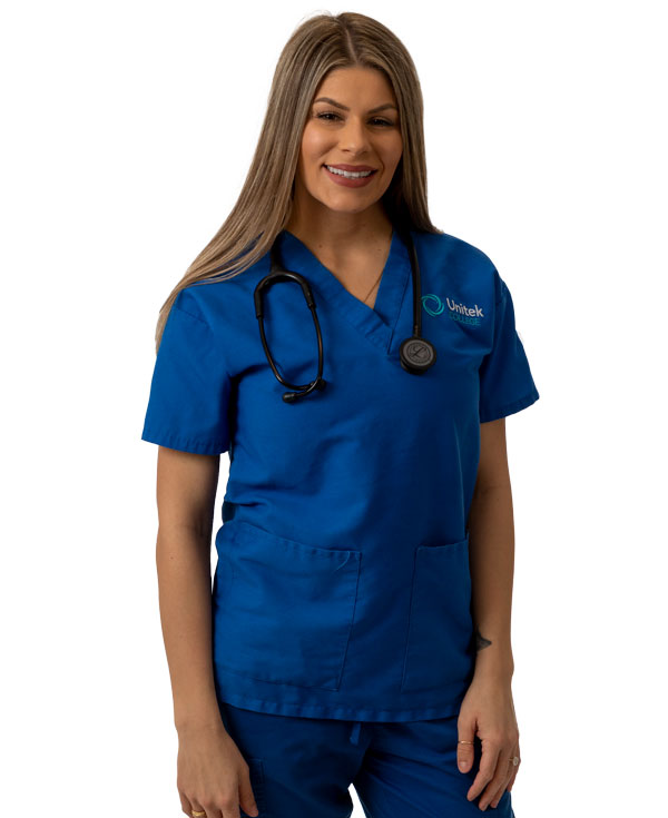 Nurse in blue scrubs wearing stethoscope