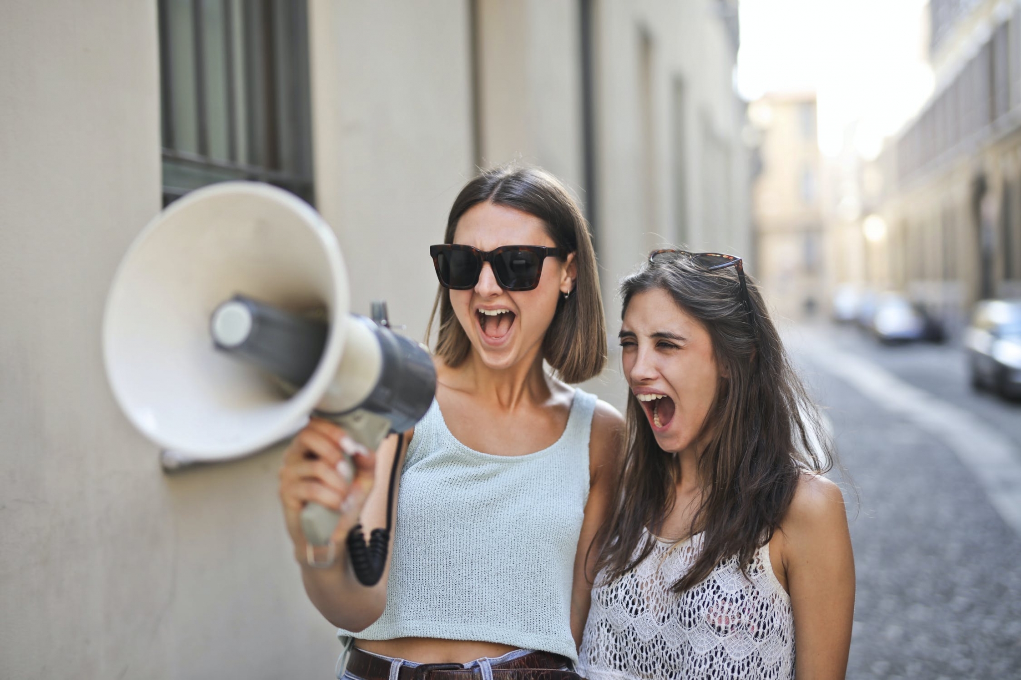 Two women with a megaphone