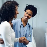 Young healthcare professional assisting a patient