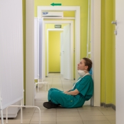 Nurse sitting in a hallway