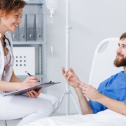 Psychiatric nurse assisting a patient