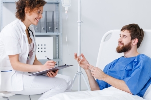 Psychiatric nurse assisting a patient