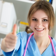 Medical Assistant giving a thumbs-up sign