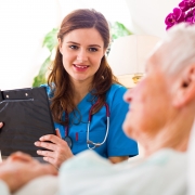 Registered Nurse smiling at a patient