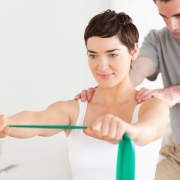 Woman using exercise bands