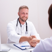 Nurse recruiter shaking a woman's hand