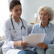 Medical professional with an elderly patient