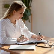 Medical professional completing paperwork