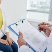 Professional taking medical history
