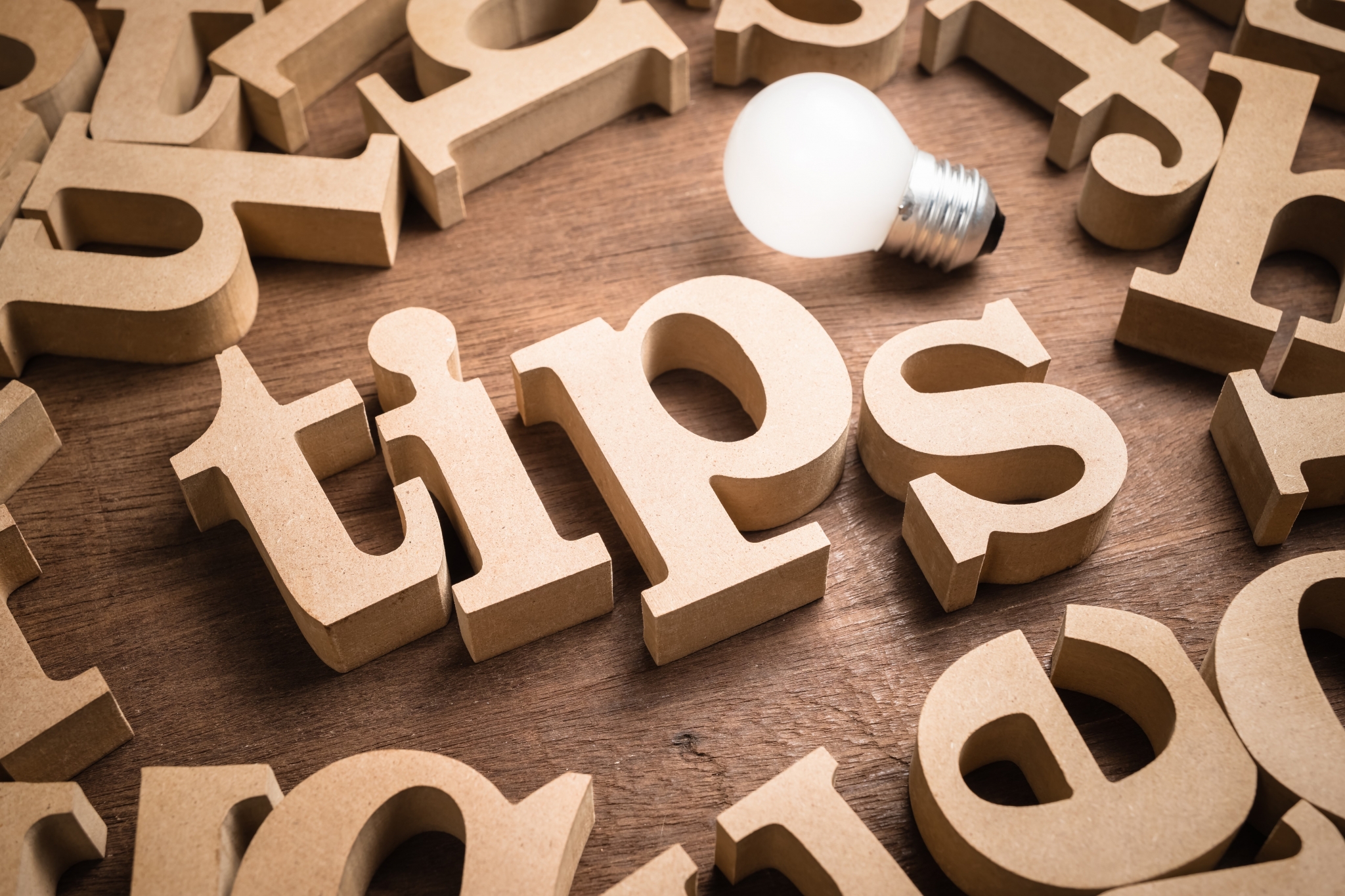 The word tips in wooden letter blocks