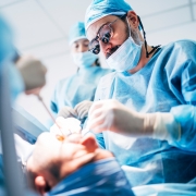 Team of dental surgeons working on a patient