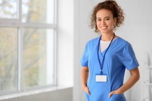 Young african-american nurse in scrubs