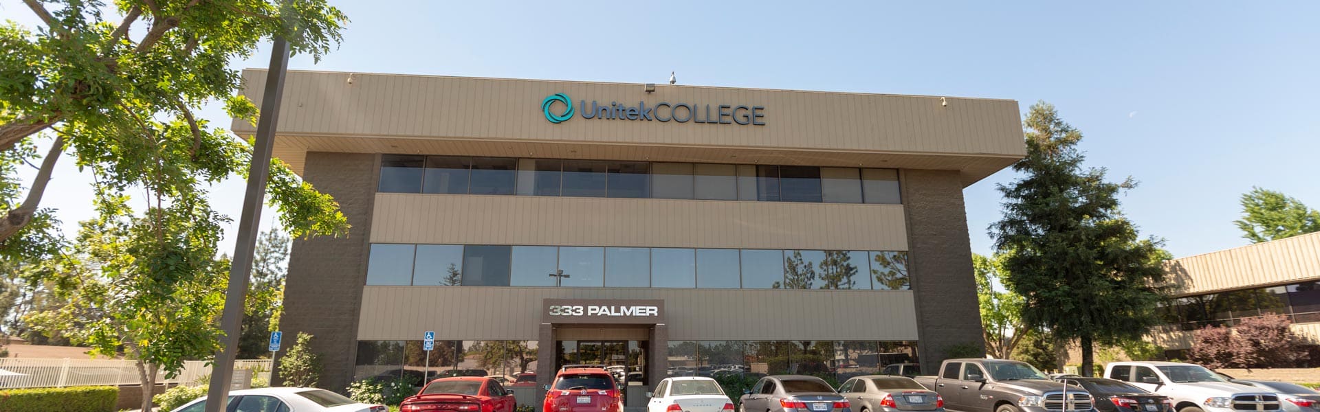 exterior view of the Bakersfield campus with the sun shining
