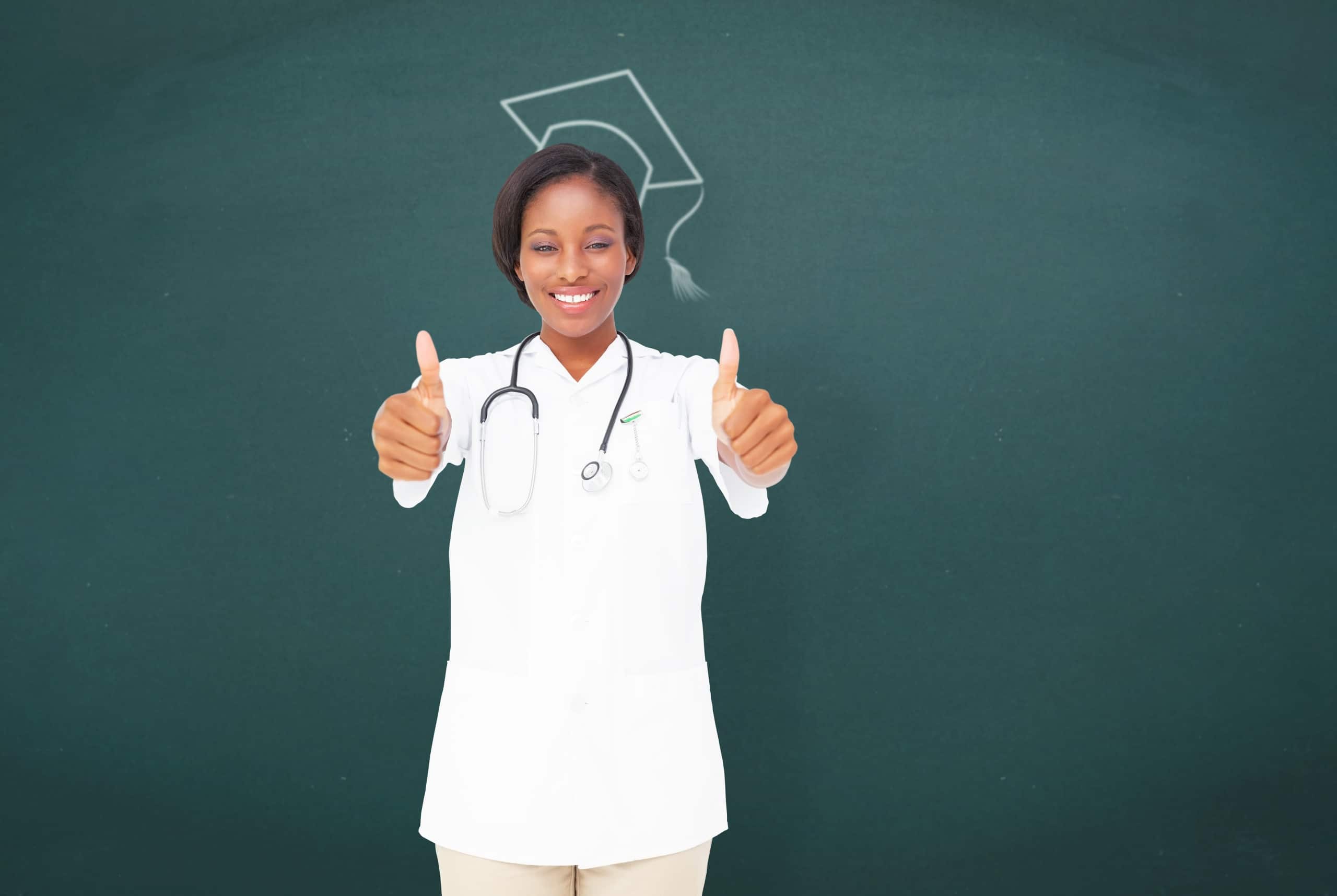 African-American medical graduate giving two thumbs up