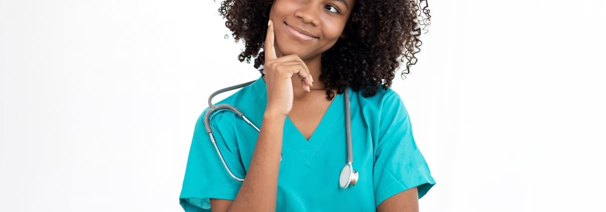 African-American nurse in a contemplative pose