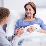 Nurse comforting a sick patient