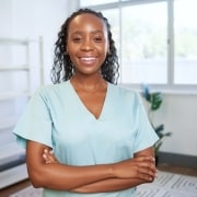 Smiling African-American physical therapy professional