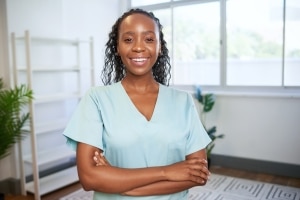 Smiling African-American physical therapy professional