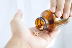 Close up of a person administering medication
